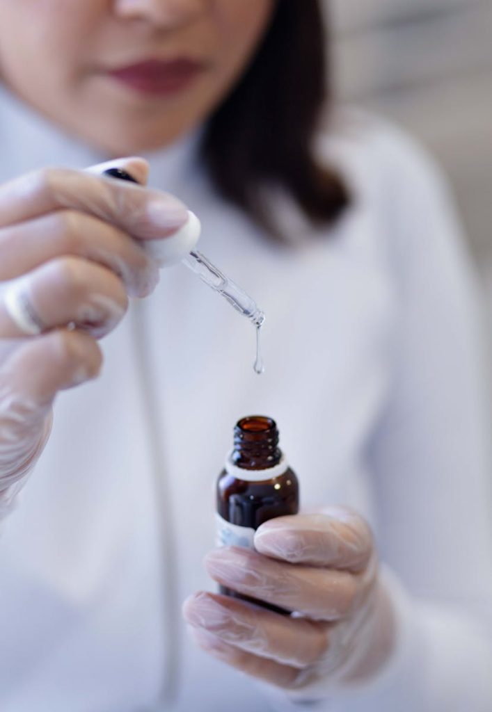 Skincare scientist reviewing UV protection claims